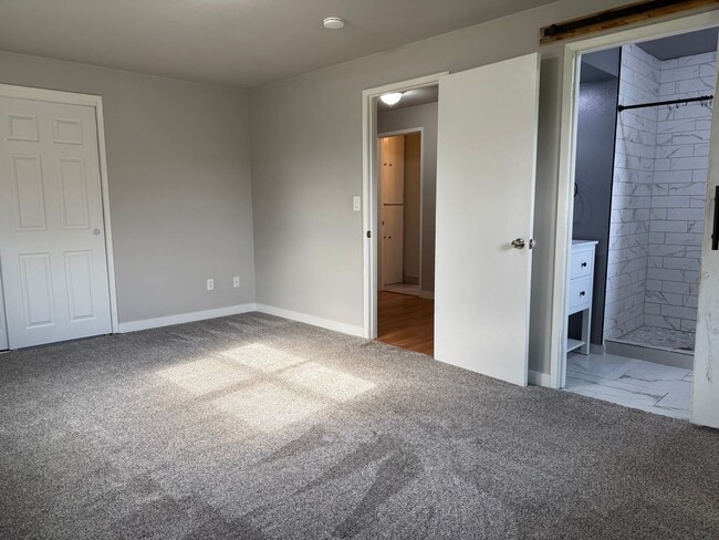 Building Photo - Spacious 3 Bedroom Home with Large Yard & 2-Car Garage