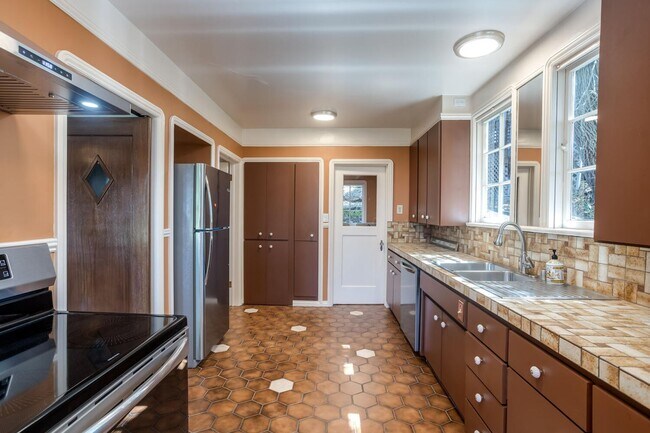 Building Photo - MUST SEE! Unique and Charming 4 bedroom 2.5 Bath Home w/Stunning Views!