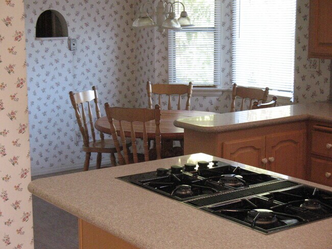 Kitchen view to dining area - 3121 W Wyoming Ave