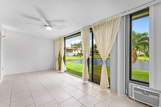 Building Photo - 8566 Casa Del Lago