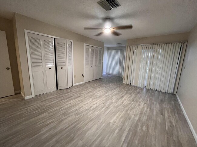 Building Photo - Two-story condominium, featuring 2 bedrooms and 2 1/2 bathrooms