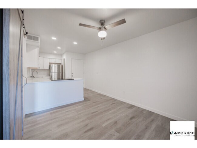 Building Photo - Fall In Love With This Stunningly Upgraded 1/1 First-Floor Phoenix Condo, Designed For Effortless Li