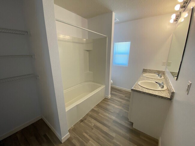 Building Photo - Four Bedroom / Three Bath Home