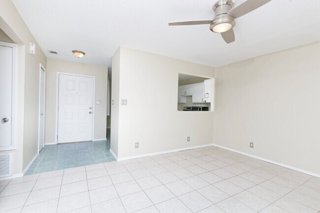 Building Photo - Bright, shiny, and updated compact home ne...