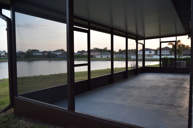 Building Photo - LIKE NEW, BEAUTIFUL, HOME ON POND, Spaciou...