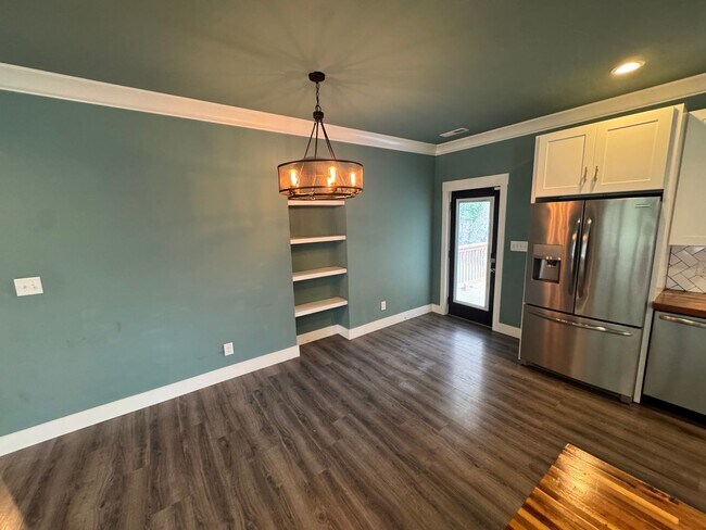 Building Photo - Modern Bungalow Charm: Designer Finishes & Expansive Backyard Living!
