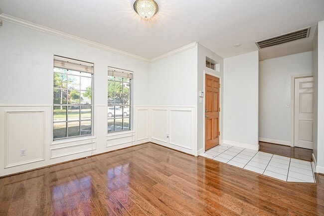 Building Photo - Discover this stunning one-story corner lo...