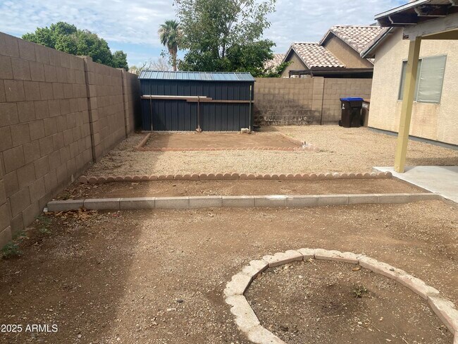 Building Photo - 8563 W Mission Ln