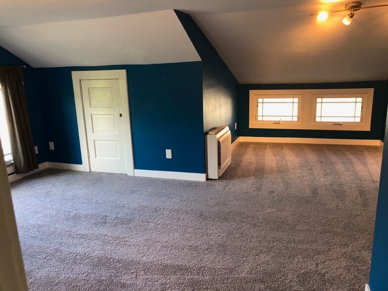 Upstairs Living Room/ 1 Bedroom - 703 SE Cesar Estrada Chavez Blvd