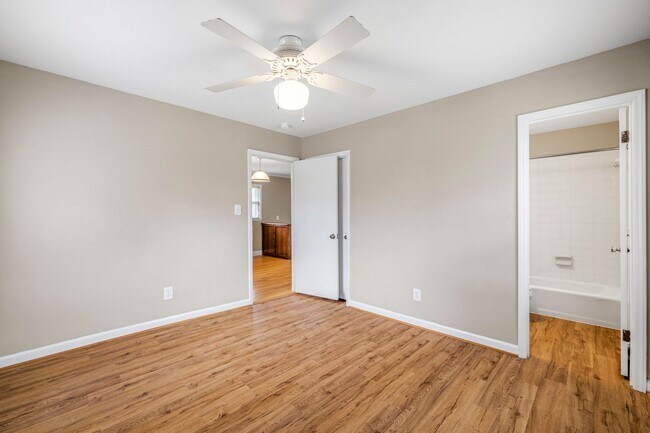 Building Photo - Large Renovated Ranch Home, Two Kitchens & Two Living Areas, Hardwood Flooring, Deck, Fenced!