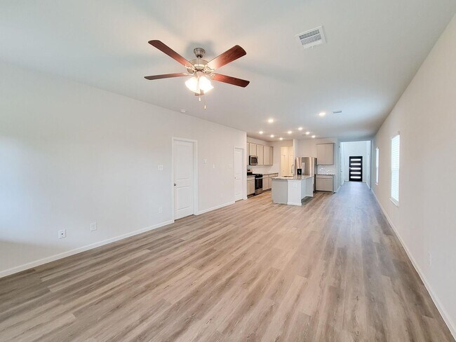 Building Photo - Welcome Home! Your never-lived-in sanctuary awaits your arrival. Have a large household? This 5-b...