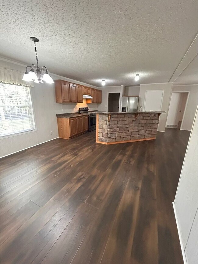 Building Photo - Immaculate 4BR Mobile Home in the heart of...