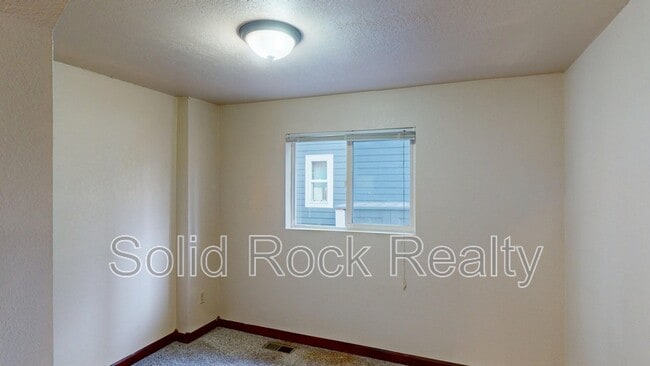 Building Photo - 511 E Cache La Poudre St