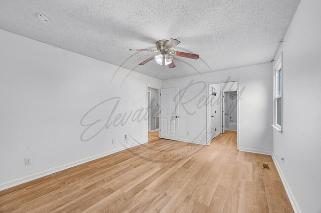 Building Photo - Four Bedroom Two Story with Two Car Garage...