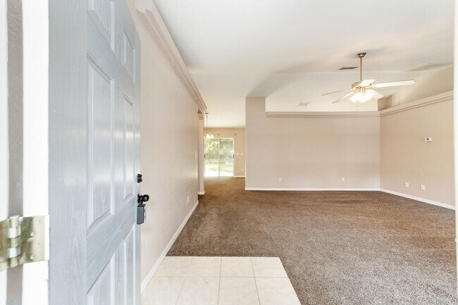 Building Photo - Peaceful 3-Bedroom Home with Open Floor Plan & Two-Car Garage in Rainbow Lakes Estates!