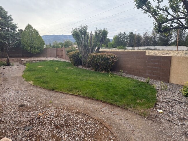 Building Photo - Location, Location!  3 Br, 2 Ba, fireplace in living room, lawn service included