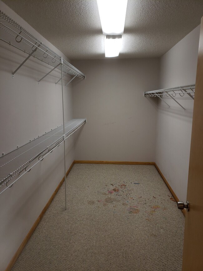 Front Upstairs Walkin closet - carpet has been replaced since photo - 4523 State Line Rd