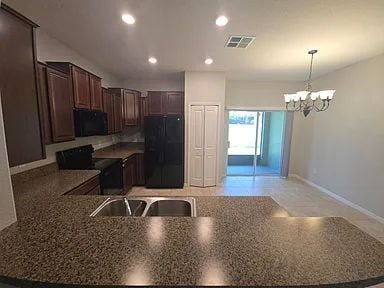 Building Photo - Spacious Townhome with Pond Views | 3BR + Loft + Screened Patio