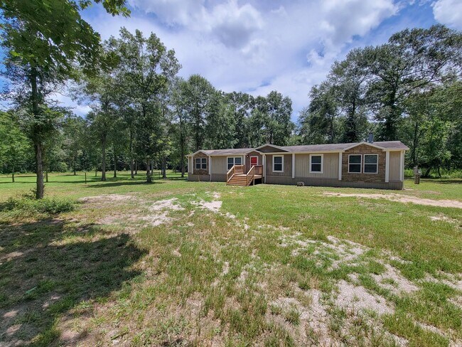Building Photo - Cozy and Adorable home 4 bedroom 2 bath home on over 1 acre near McRae Lake! Relax on the covered...
