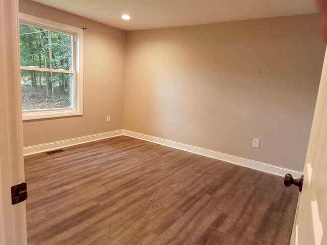 Building Photo - 3 Bedroom - 2 Bath Rancher on Two Acres