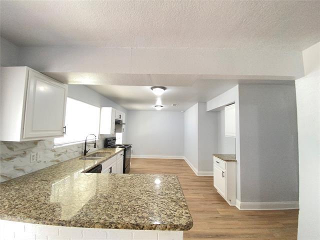 Building Photo - 1011 N Lucas Dr