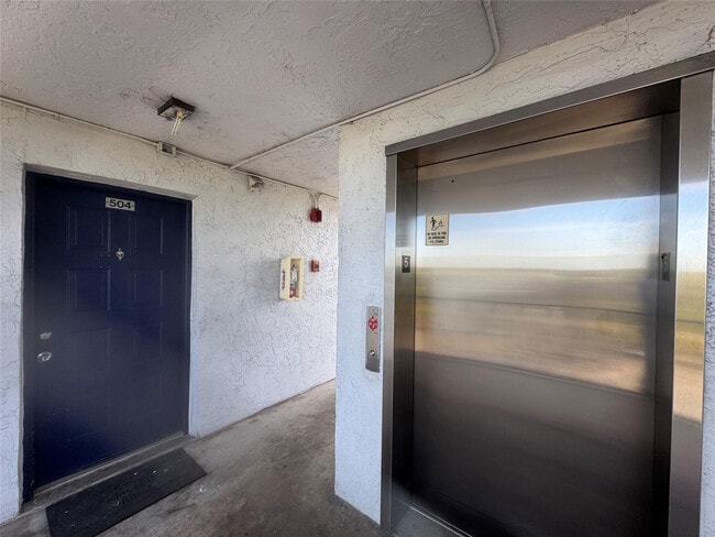 Building Photo - 8750 N Sherman Cir