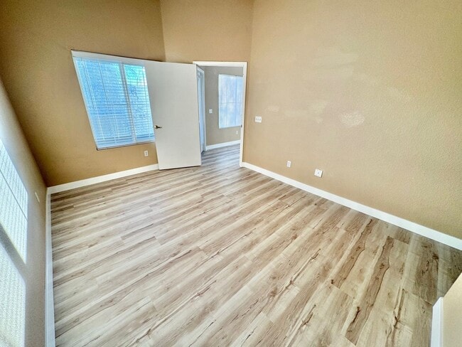 Building Photo - Welcoming 2 Bedroom home with private balcony located in South Las Vegas Community