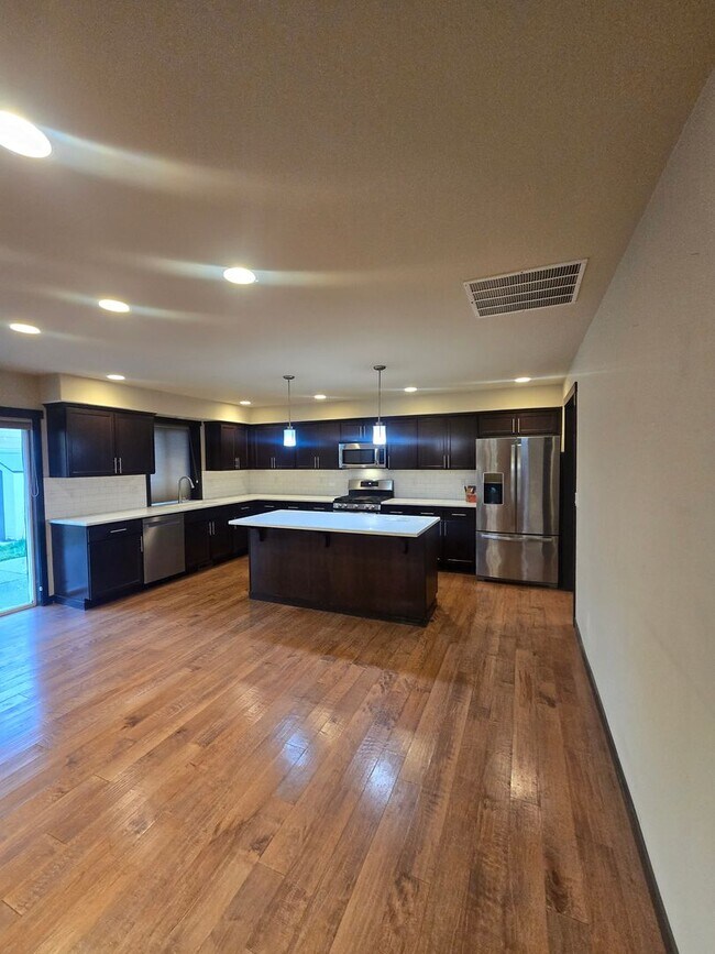 Building Photo - Welcome to this beautiful 4-bedroom, 2.5-b...
