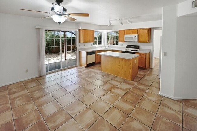 Building Photo - Elegant 4-Bed Home with Balcony & Backyard...