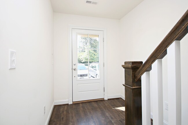 Building Photo - Light-Filled Townhome With Utilities Inclu...