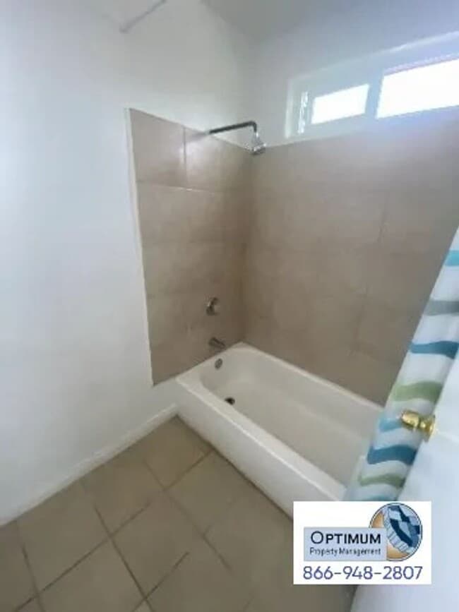 Building Photo - Spacious 1-Bedroom, 1-Bathroom Apartment with Tile Flooring