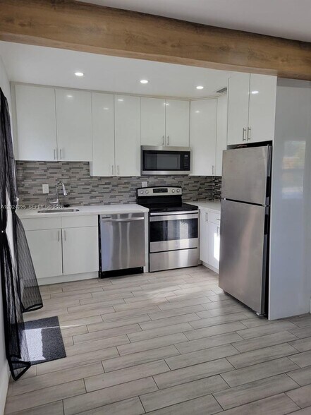Building Photo - 6401 SW 58th Ave