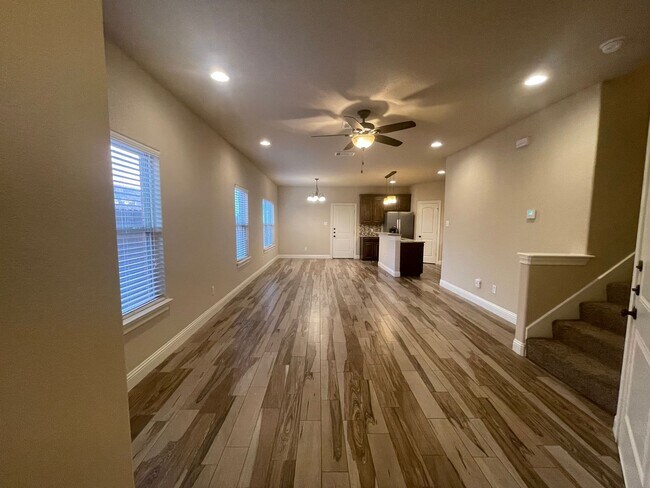 Building Photo - Beautiful Benbrook 3B/2.5B Townhome ((Stainless Steel Appliance Package)) Dazzling wood-like tile...