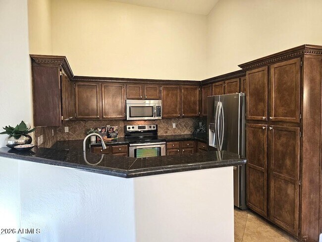 Building Photo - 10061 E Evans Dr