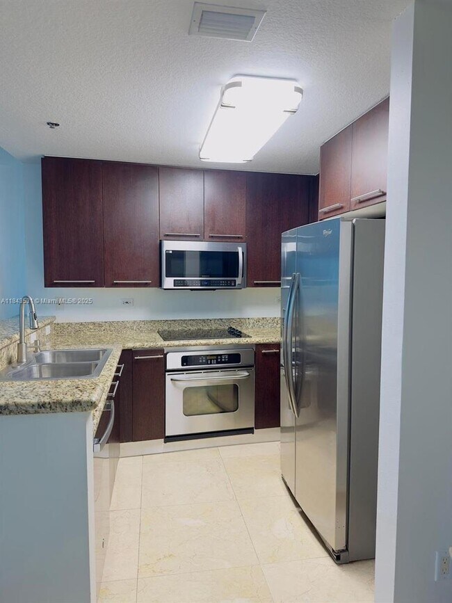 Building Photo - 6515 Collins Ave