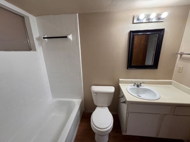 Building Photo - 2 bed duplex with 1 1/2 baths, bonus room and a 1 car garage for lease in SW OKC! (no fenced yard)