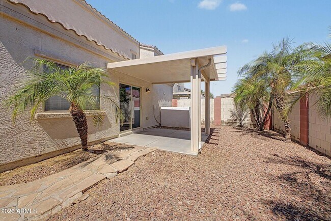 Building Photo - 8777 W Dahlia Dr