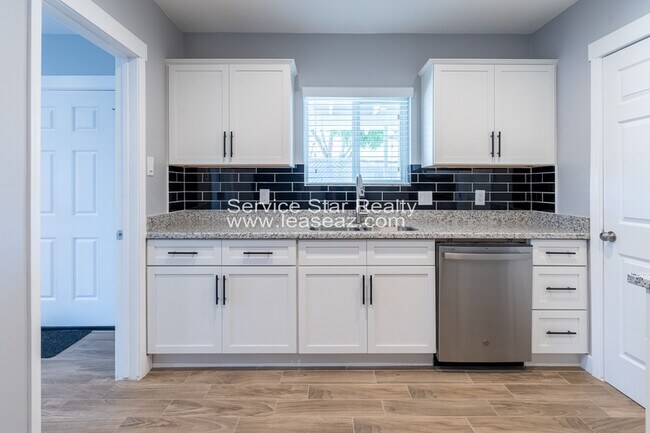 Building Photo - 4144 N 3rd Ave
