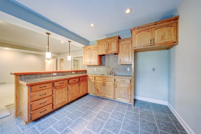 Building Photo - {14400} Somerset Brooke + Beautifully Updated Throughout + Finished Walk Out Basement + Fenced Yard