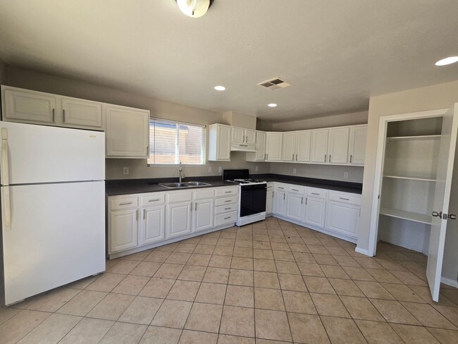 Building Photo - 4-Bedroom Home in 89106 - Ask about our on...