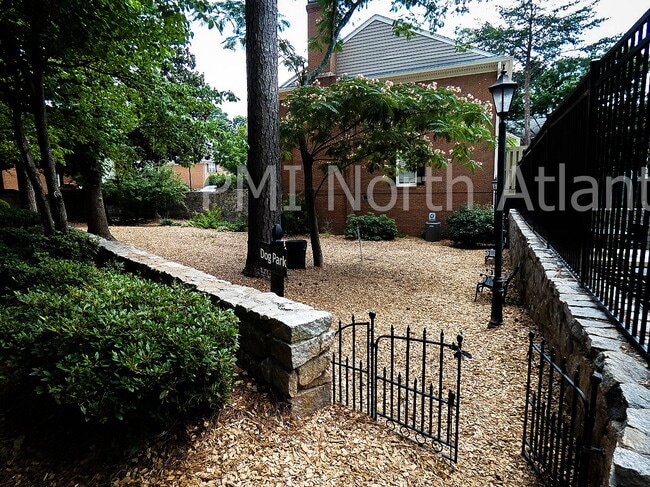 Building Photo - Now Available – Stunning 2-Bedroom Townhom...