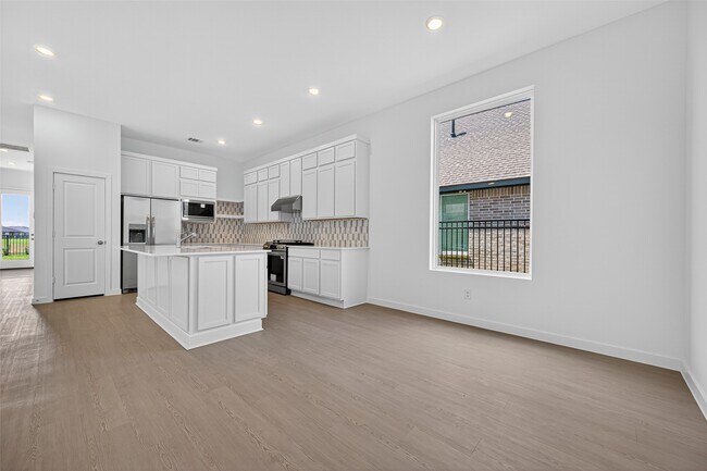 Building Photo - 27423 Sunterra Village Dr