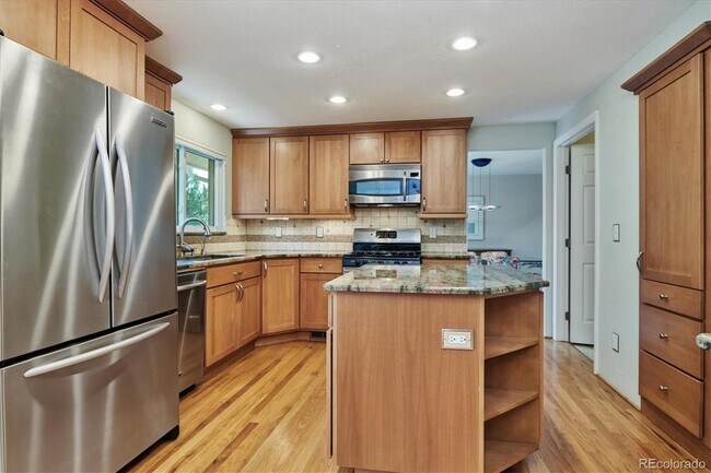 Building Photo - 10725 E Maplewood Dr