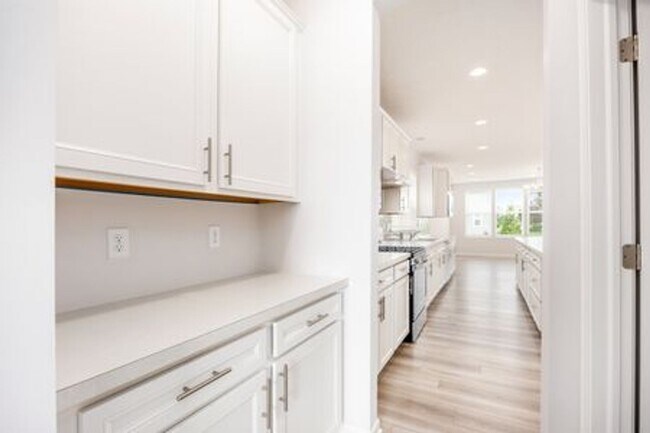 Building Photo - Updated 3-Bedroom Home with 3 Baths, Open-Concept Layout, Luxury Flooring & Bright Modern Kitchen