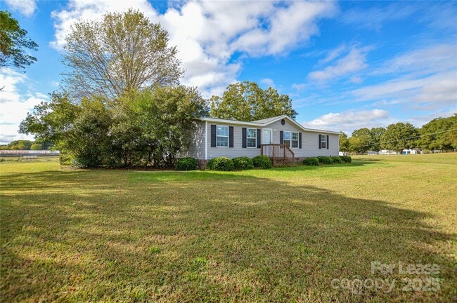 Building Photo - 711 W C J Thomas Rd