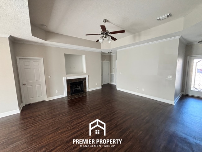 Building Photo - Charming 3BR Tuscaloosa Home | Hardwood Floors, Brick Fireplace, 2-Car Garage & Fenced Yard