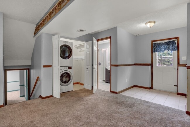 Building Photo - Spacious 4-Level Home with Deck, Workshop ...