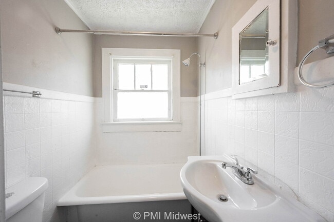 Building Photo - "Charming 1-Bedroom Duplex Retreat on East...