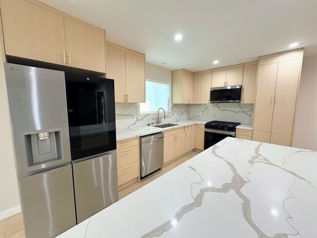 Building Photo - 6722-6724 Hesperia Ave. &amp; 18020 Welby Ave.