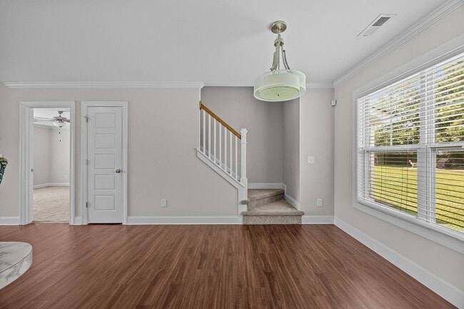 Building Photo - Three-bedroom, two-bathroom home located i...